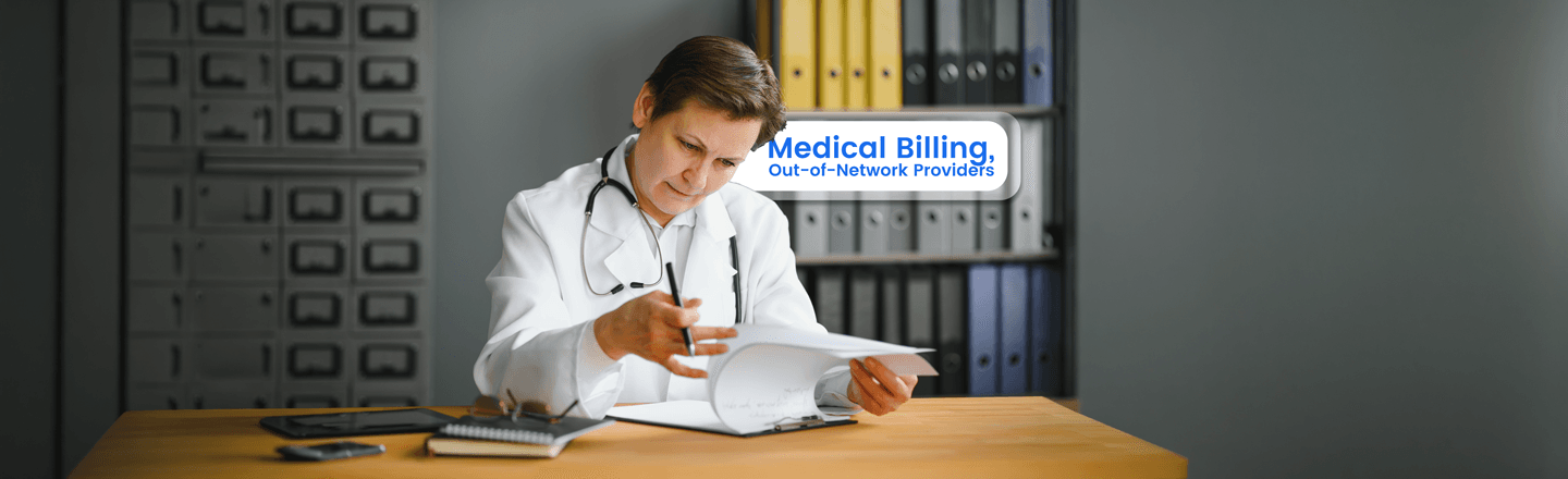 Doctor reviewing patient billing paperwork at a desk